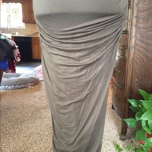 Dry flattering tight fitting olive green dress